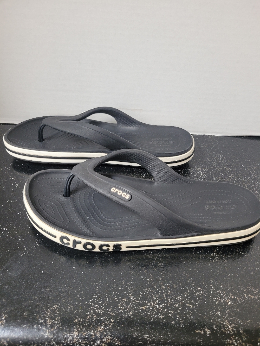 Crocs Classic Flip Sandals in Black with White Trim